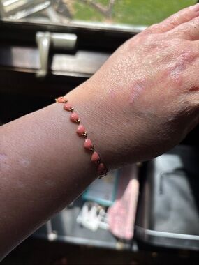 Gold-Tone Bracelet with Pink Heart Accents